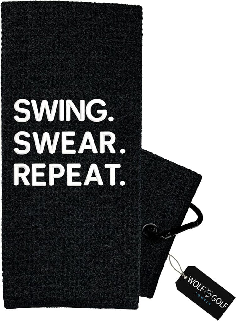 funny golf towel - in black color with white color says "swing, swear, repeat" 