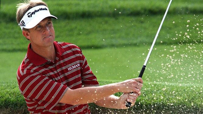 David Toms WITB photo hitting golf ball out of sand trap.
