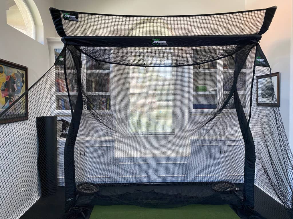 SkyTrak Golf Simulator Review, showing our set up shown in the house, and limited space around it.