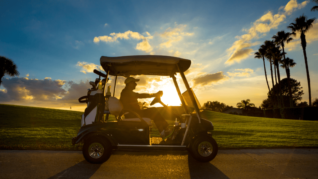 Golf After Hip Replacement, ride in a nice golfcart as shown.  Gentleman sitting in his cart with a beautiful sunset.
