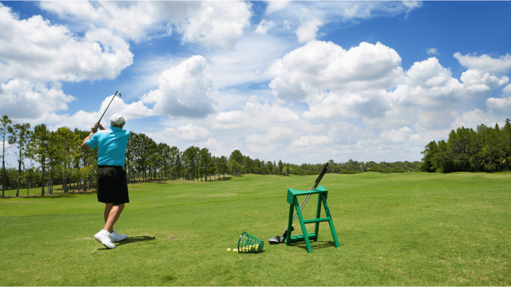 Golfer hitting multiple clubs at the driving range on a beautiful sunny day. 
Senior vs Ladies Flex article.