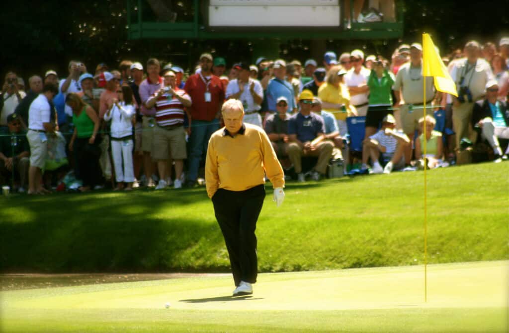 Jack Nicklaus walking to his golf ball at Augusta National 9th Putting Green in 2006.  