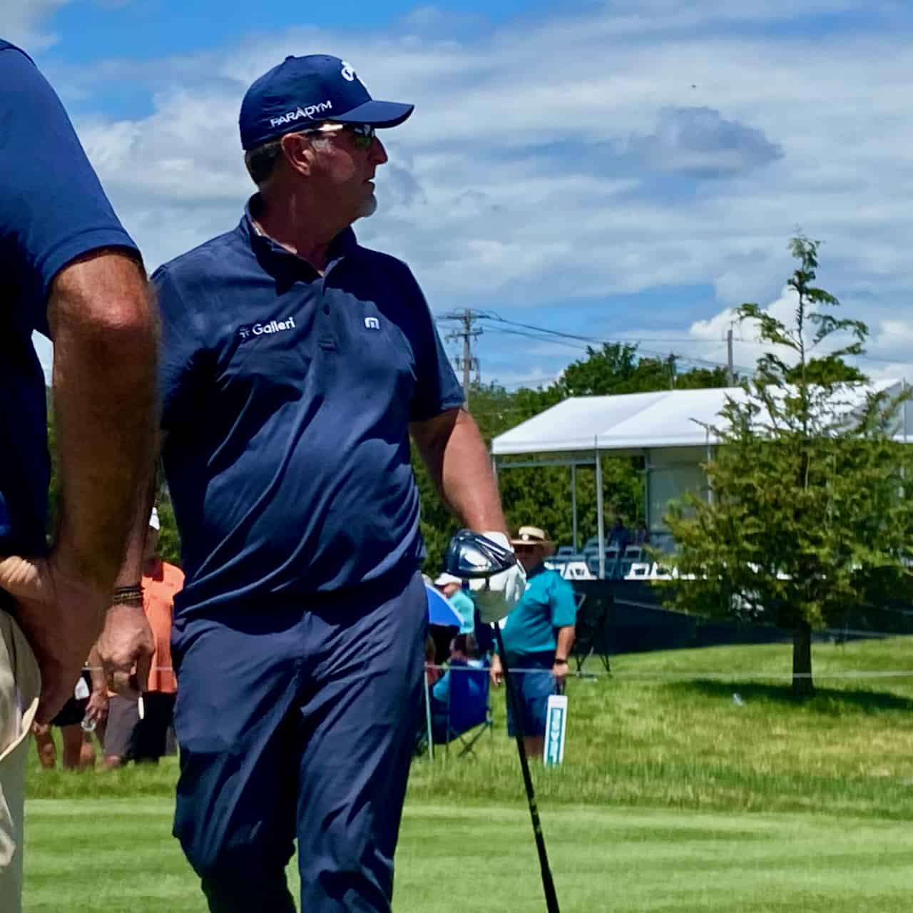 David Duval showing carrying his driver off the tee box in June 2023.